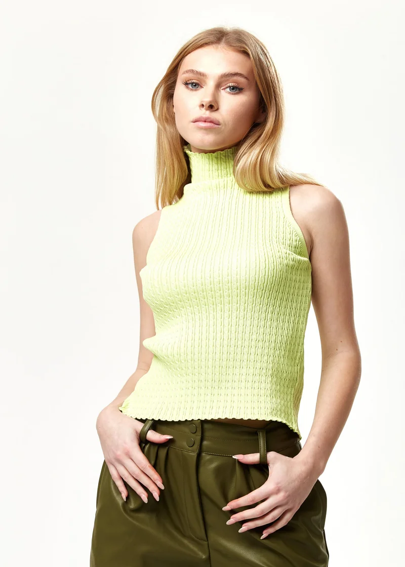Liquorish SLEEVELESS KNITWEAR TOP IN PISTACHIO