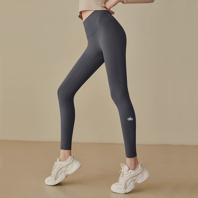 Alo Yoga High Waist Peach Butt Seamless Yoga Pants for Running and Fitness - Image 1
