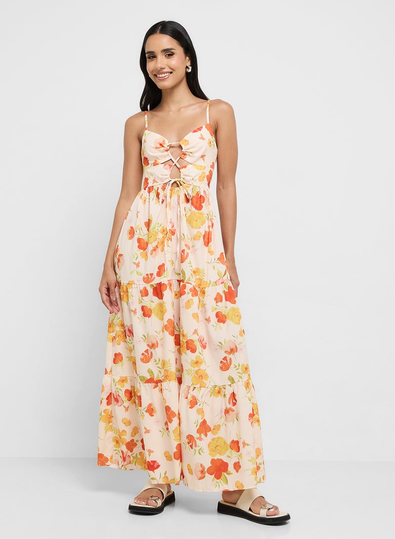 جينجر فستان صيفي مزين بالزهور مع تفاصيل مقصوصة وأشرطة - Image 1