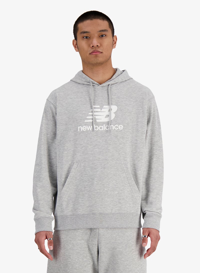 نيو بالانس هودي أساسي بشعار من نسيج تيري الفرنسي - Image 1