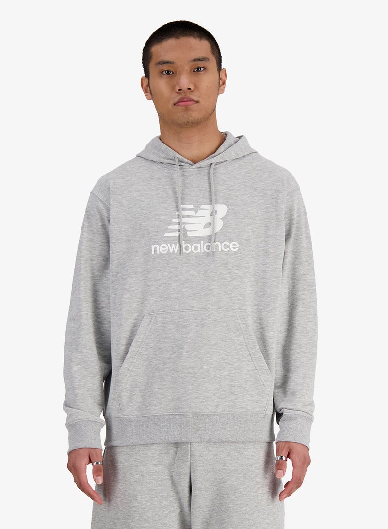 نيو بالانس هودي أساسي بشعار من نسيج تيري الفرنسي - Image 1