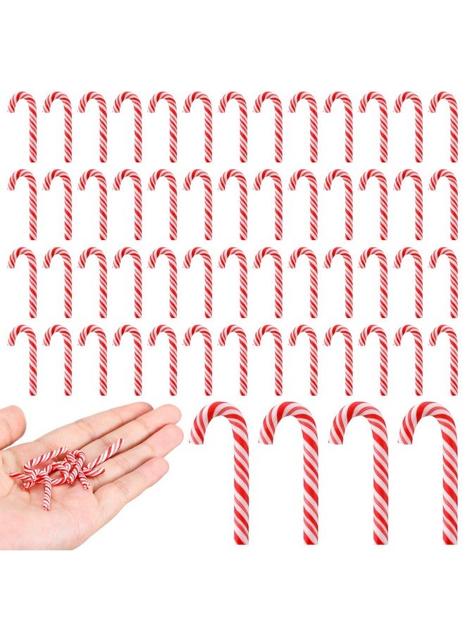 جيجكسين 60 قطعة من عصي الحلوى الصغيرة لعيد الميلاد للحرف اليدوية زينة عصا الحلوى البلاستيكية زينة الحلوى الصغيرة للديكور مجسمات عيد الميلاد للحرف اليدوية حلوى صناعية صغيرة لتعليقها على الشجرة (أحمر وأبيض) - Image 1