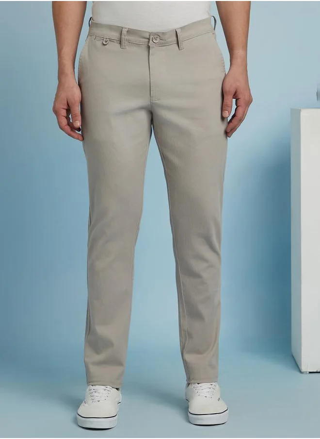 دينيس لينغو Sleek Light Grey Straight Fit Chinos for Men with a mid-rise fit, coin pocket detailing, and a soft yet durable cotton-lycra blend for effortless styling.