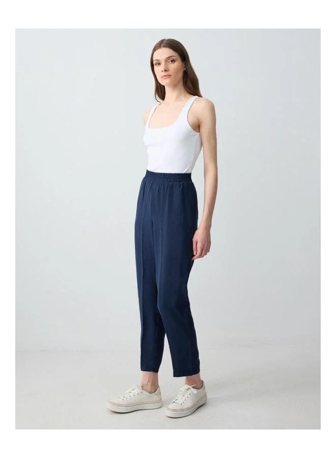 Jimmy Key Navy Blue High Waist Straight Leg Modal Knit Pants.