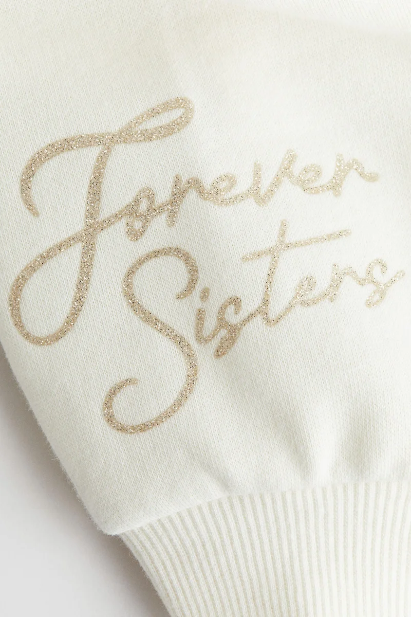 اتش اند ام سويت شيرت مزيّنة بطبعة