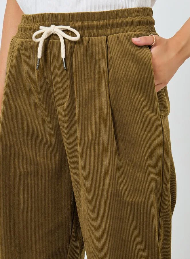 Styli Solid Corduroy Wide Leg Pants