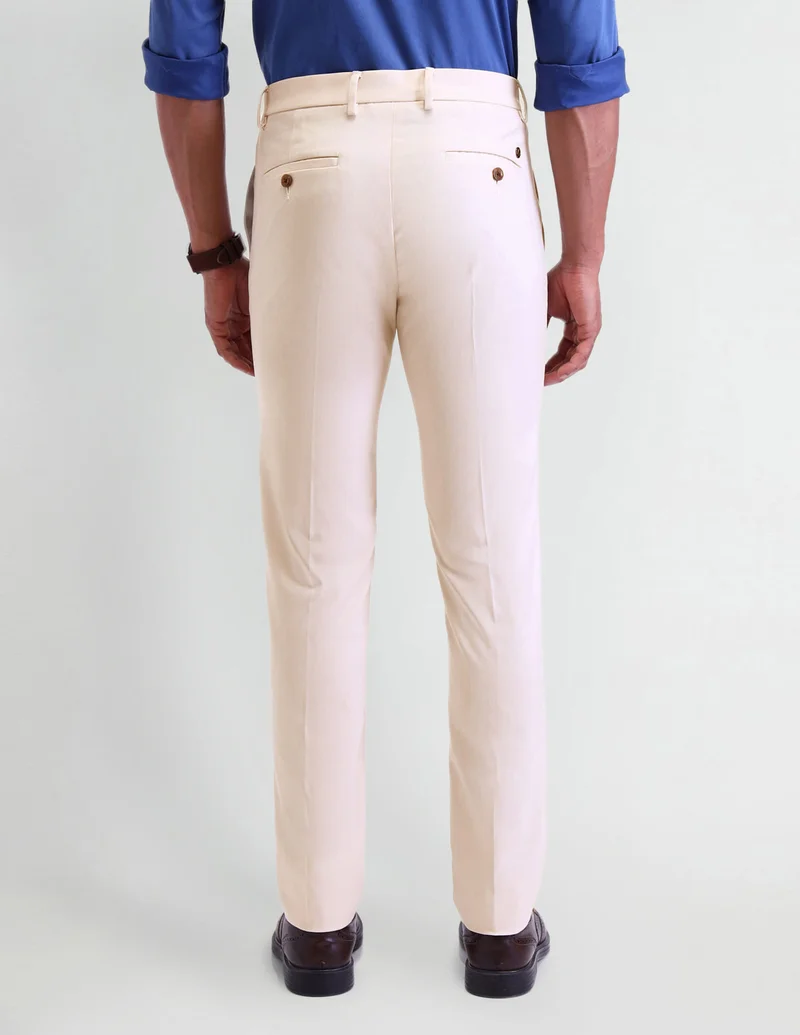 Arrow Beige Mid Rise Elasticated Slim Fit Trousers for Men | Best Price UAE