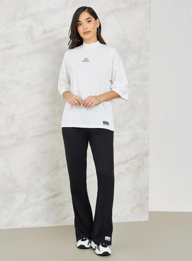 Styli Printed High Neck Drop Shoulder T-shirt and Flared Co-ords