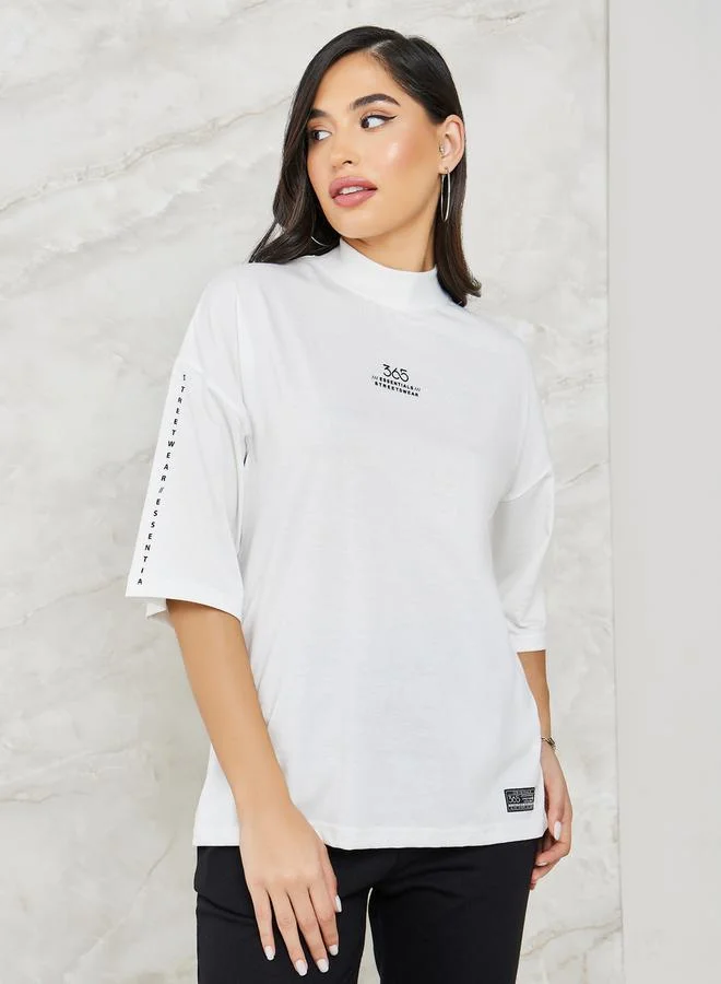 Styli Printed High Neck Drop Shoulder T-shirt and Flared Co-ords