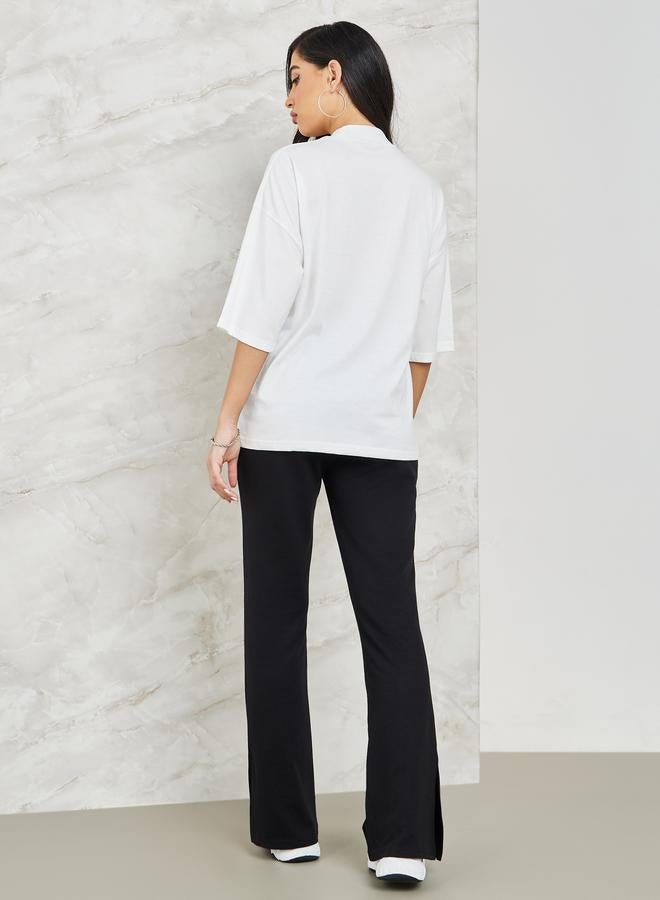 Styli Printed High Neck Drop Shoulder T-shirt and Flared Co-ords - Image 5