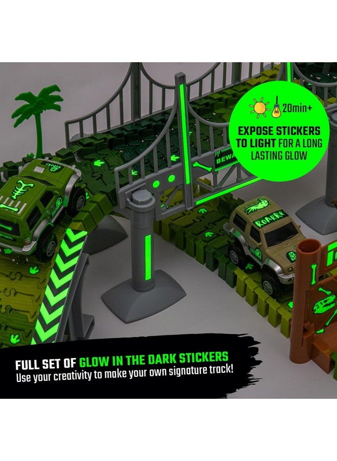 جيتيري جيت مجموعة ألعاب JITTERYGIT Dinosaur Jurassic Race Track Train المضيئة في العالم الداكن، حديقة سباق الديناصورات للأطفال تتضمن مجموعة لعب T-Rex وTriceratops - أفضل هدية عيد ميلاد للأولاد والبنات من سن 3 4 5 6 7 8 سنوات  - Image 2