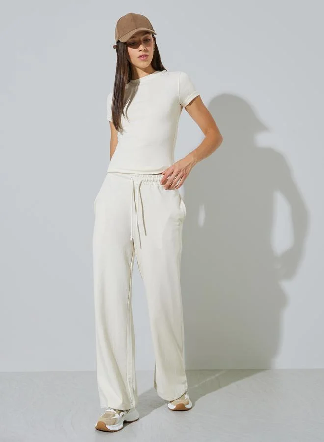 ستايلي Cream Cotton Blend Wide Leg Joggers