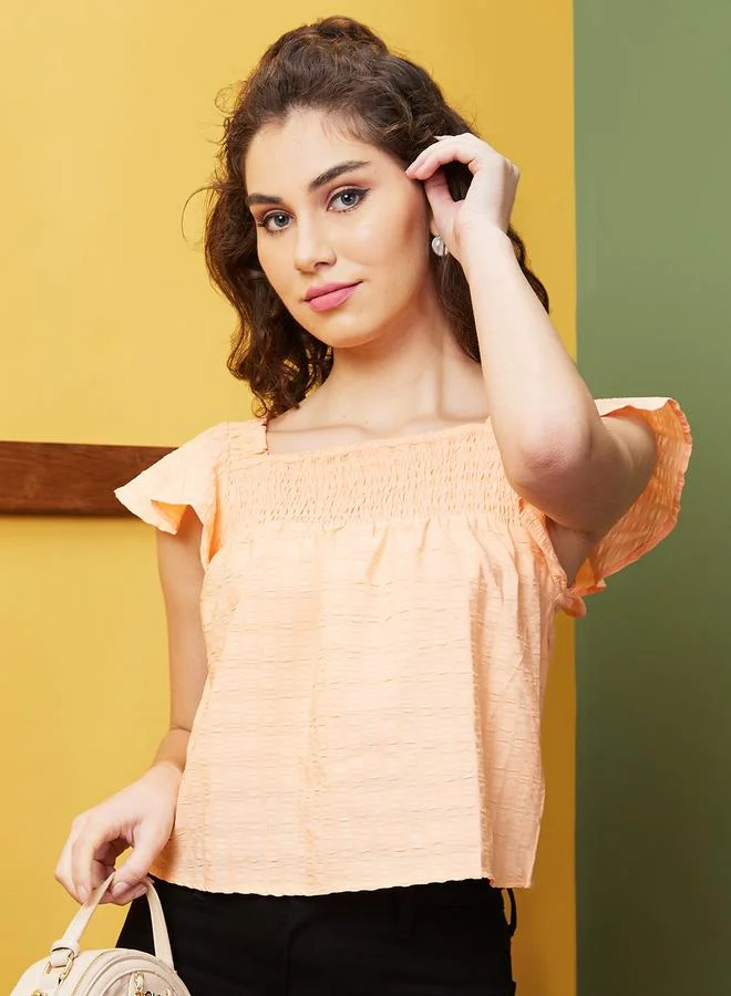 جلو باص بلوزة كروب بأكمام واسعة وياقة مربعة من جلوبس