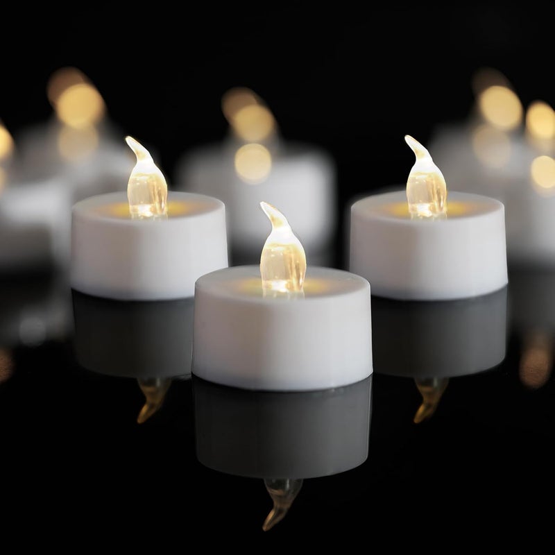 LANKER 24 Pack LED Tea Lights Candles, Warm White Flickering Flameless Tealights, Long Lasting Battery Operated Fake Candles, Decoration for Halloween (Warm White - 24pcs) - Image 1