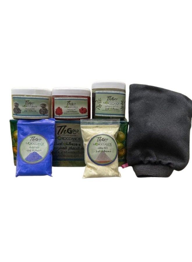 The Moroccan Bath 6-in-1 Set from Morka Oil includes a foot scrub, Moroccan soap, Moroccan clay, Moroccan loofah, white henna, indigo, and a foot mask – a luxurious spa experience at home. - Image 1