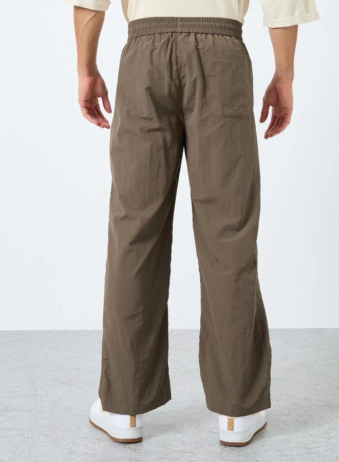 Styli Brown Men Straight Leg Pants with Drawstrings for Men | Best Price UAE