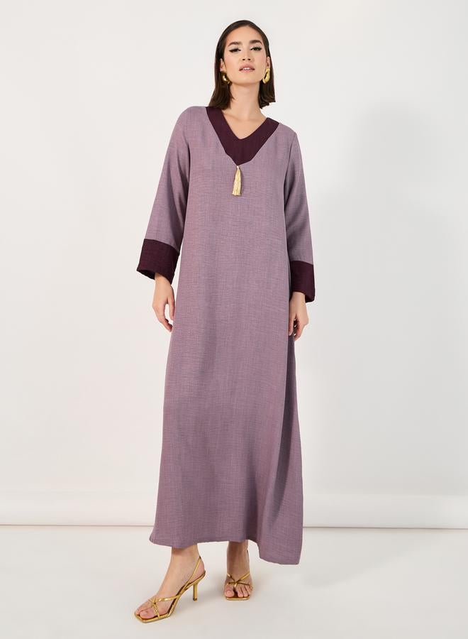 ستايلي جلابية بتفاصيل مُتباينة وشراشيب - Image 1