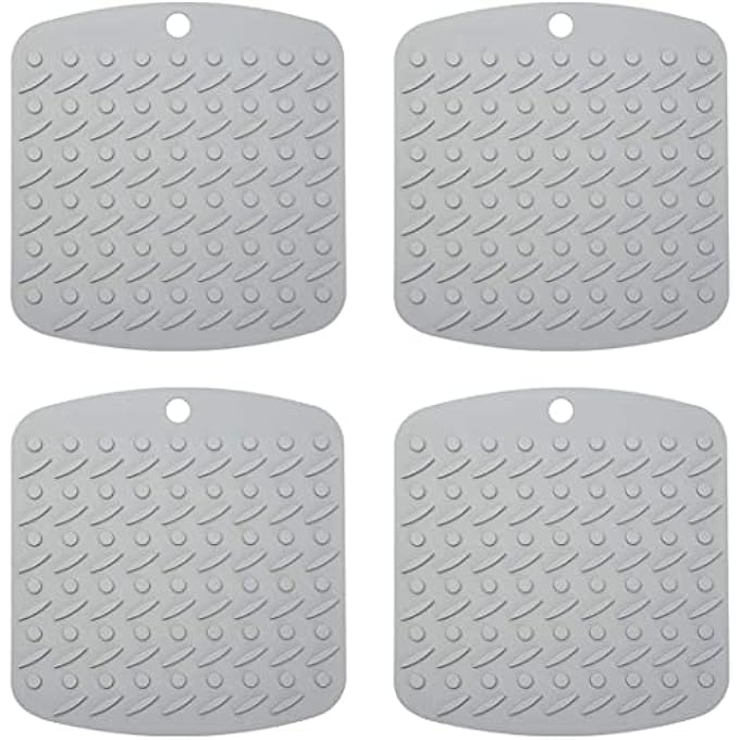 KASTWAVE Silicone Trivet Mat Hot Pot Holders Hot Pads For Kitchen NonSlip Heat Resistant Jar Opener Spoon Rest Garlic Peeler Potholders 4 Pack 7X7 Grey Modern Kitchen Tool - Image 1