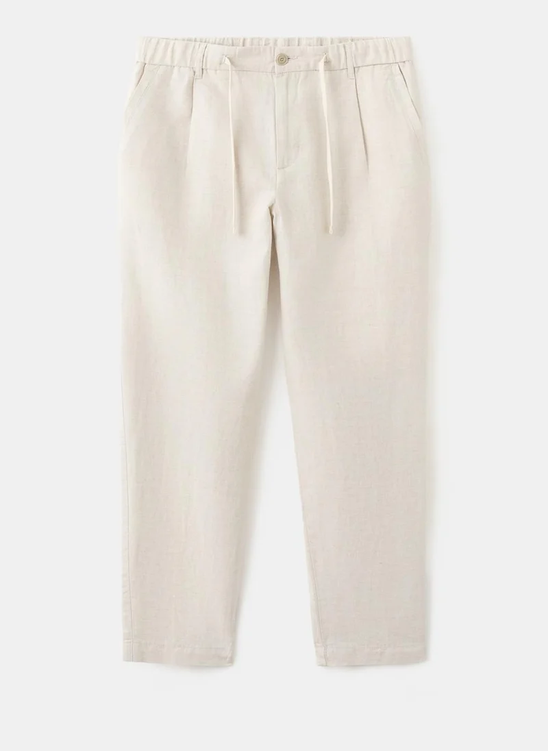 Mango Man  Slim fit cropped linen-cotton trousers for Men | Best Price UAE