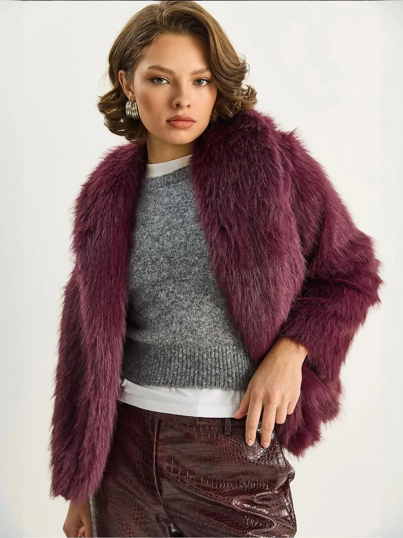 بيانكو لوتشي معطف فرو صناعي لوكسي