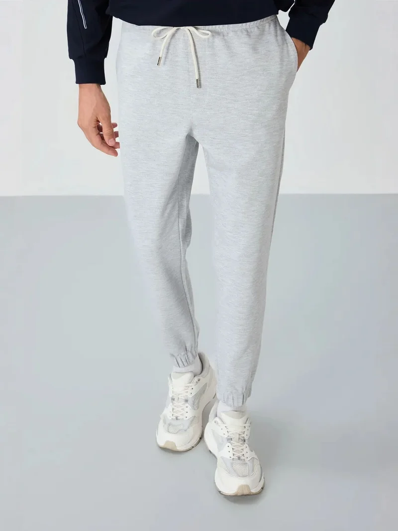تومي لايف TOMMY Men's Regular Fit Fleece Sweatpants