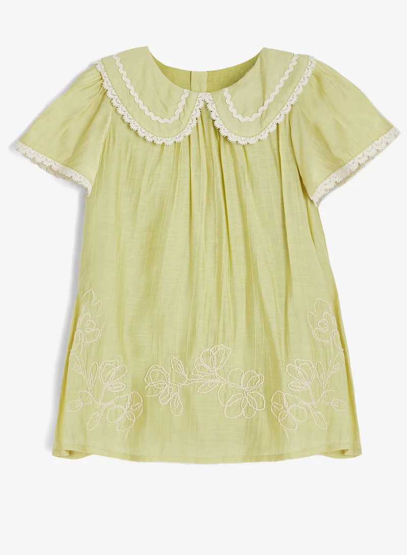 ريبلز مع نمشي Embroidered Baby Girls Dress with Lace Collar