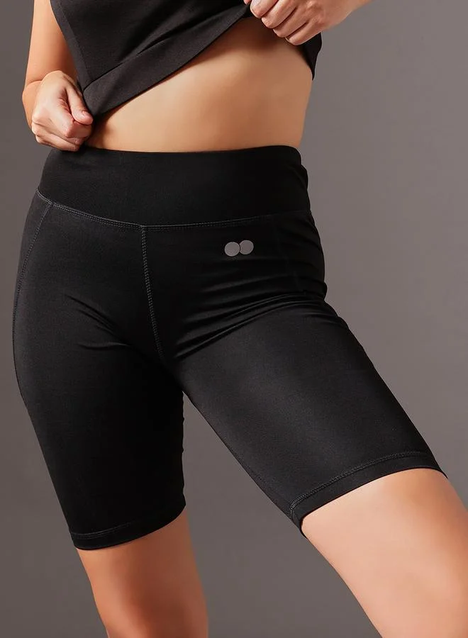 Clovia  Black Solid High-Rise Cycling Shorts for Women | Best Price UAE
