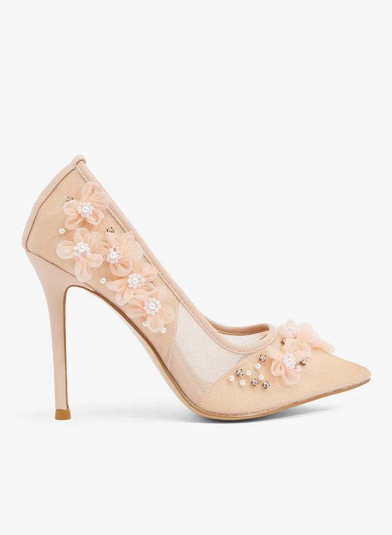 Blush mesh pump with floral applique and pearls, pointed toe, stiletto heel