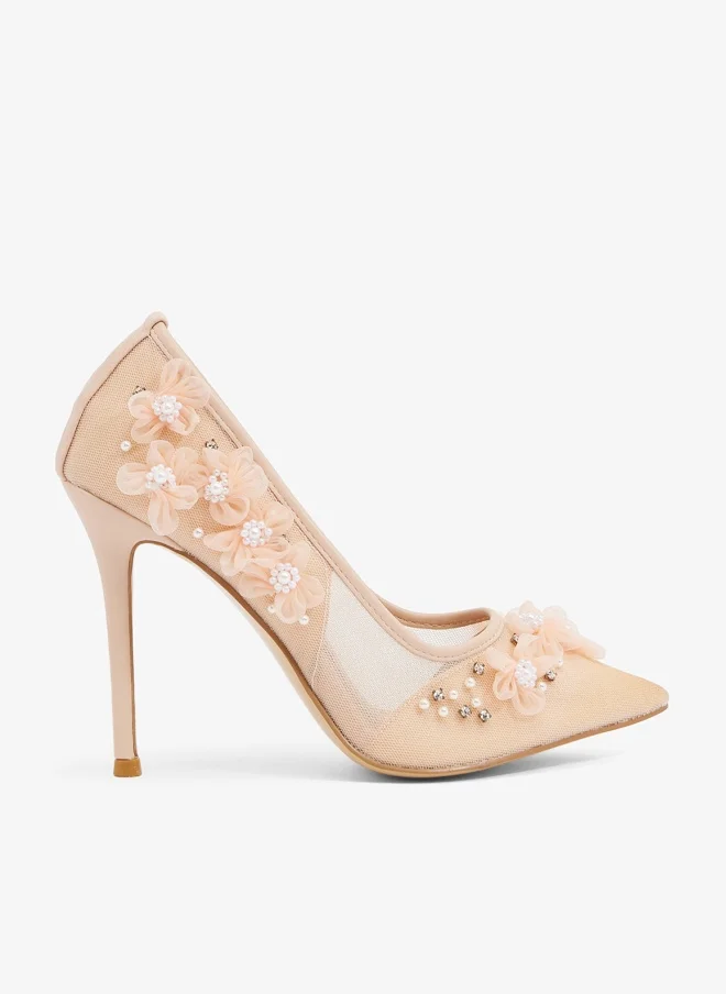 Blush mesh pump with floral applique and pearls, pointed toe, stiletto heel