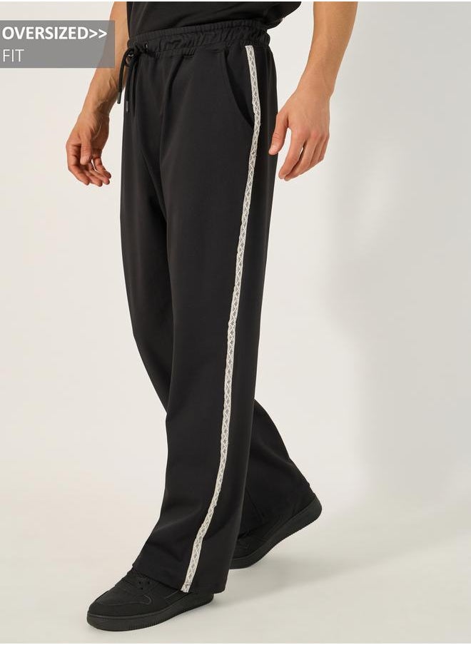 Styli Styli Oversized Mid Rise Drawstring Joggers with Side Jacquard Tape  - Image 1