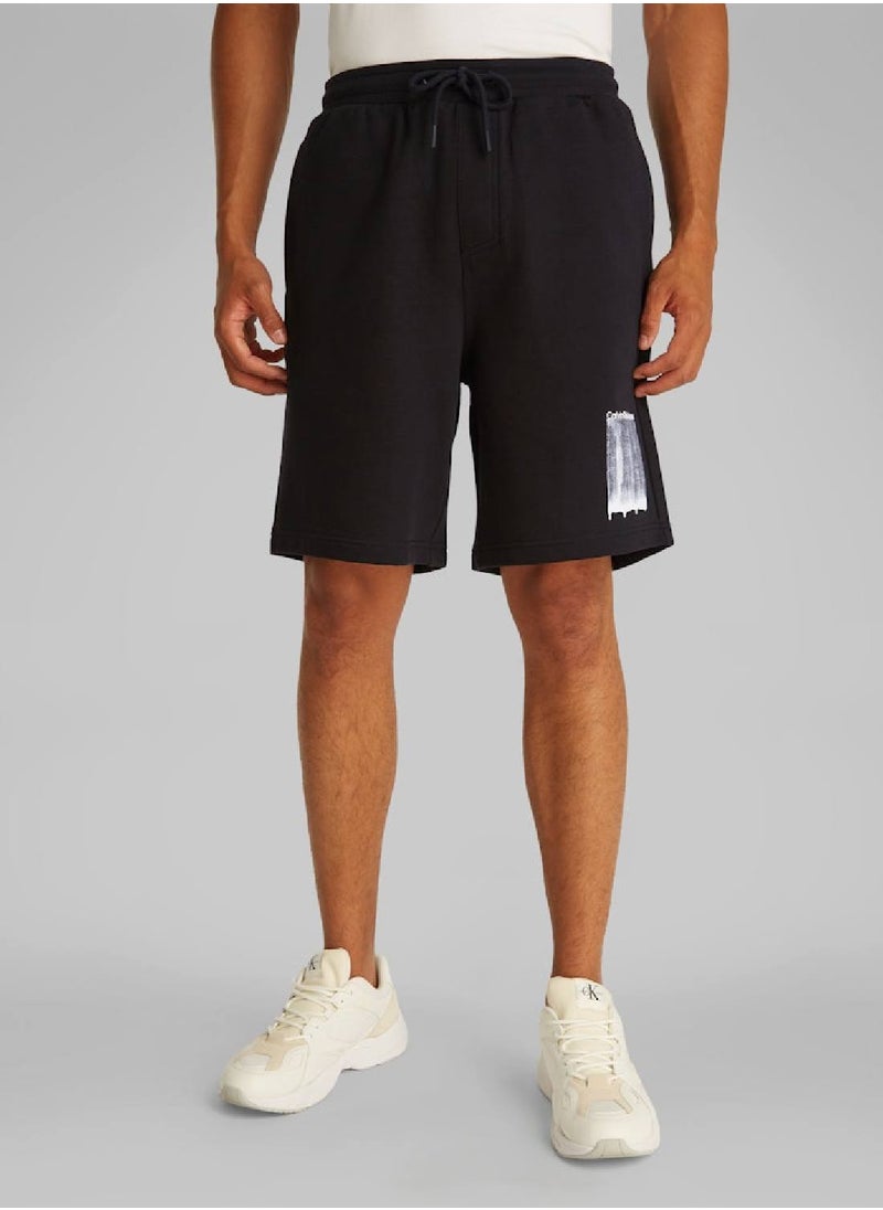 Calvin Klein Jeans Men's Graphic Sweatshorts - Cotton, Black  - Image 1