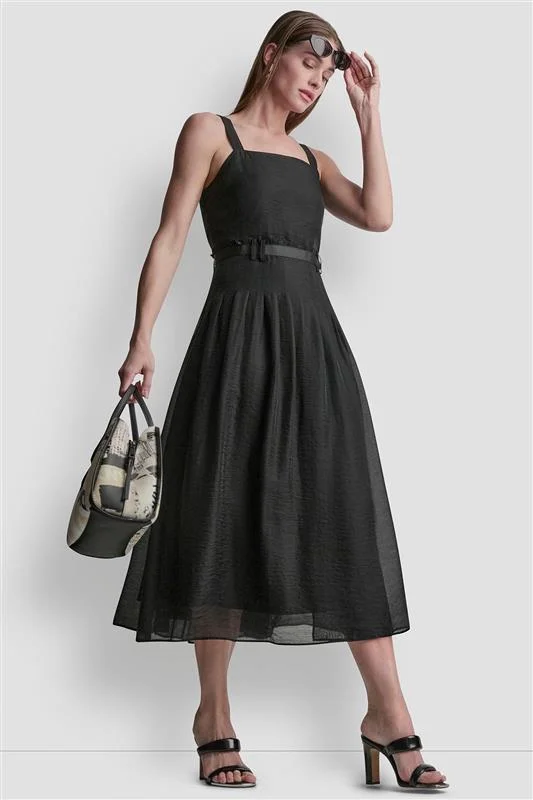 د ك ن ي SLEEVELESS BELTED GAZARE DRESS