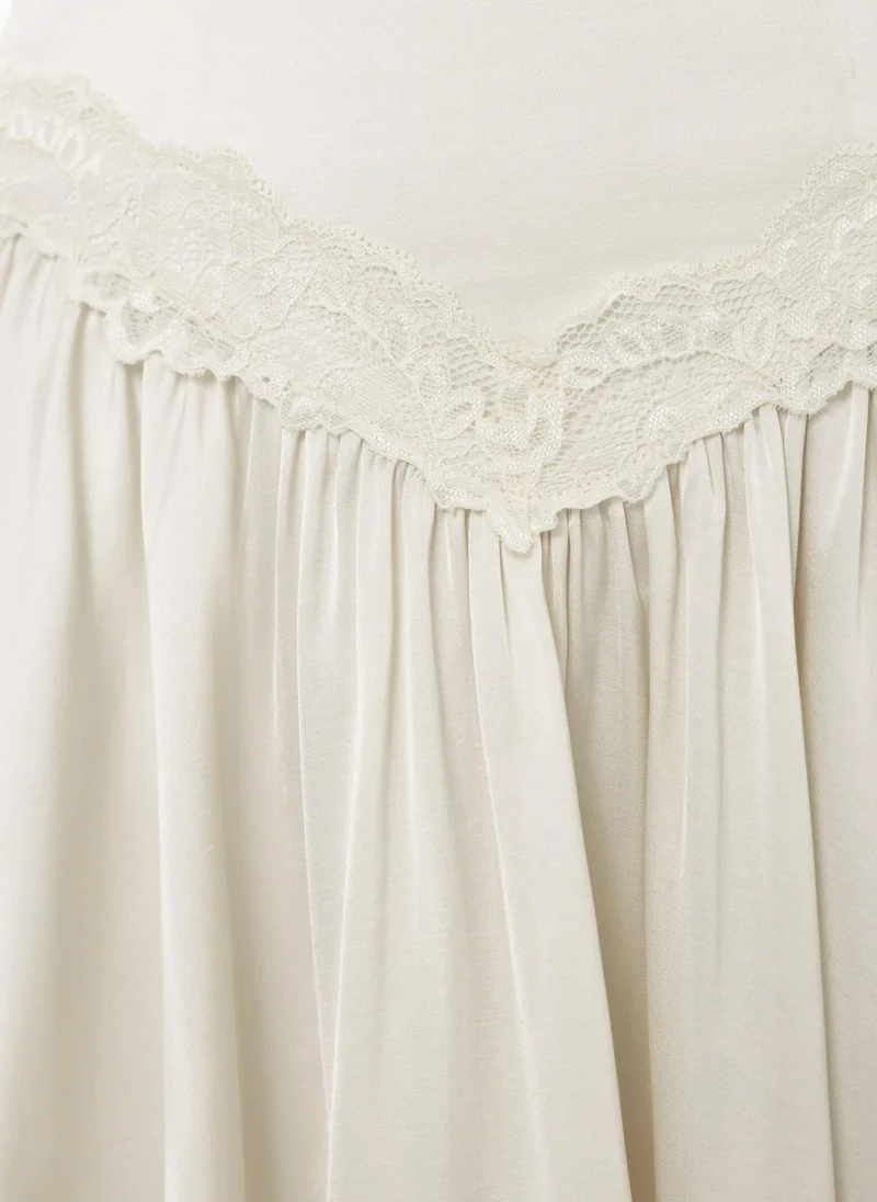 Lichi  Viscose mini dress with lace detailing and ties at the bodice for Women | Best Price UAE