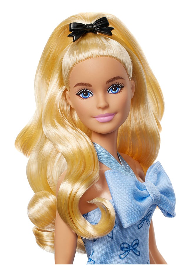 Barbie Fashionistas Doll #237 with Wavy Blonde Ponytail Wearing Blue Bow Halter Dress, Black Hair Bow Accessory and Matching Blue Heels  - Image 2