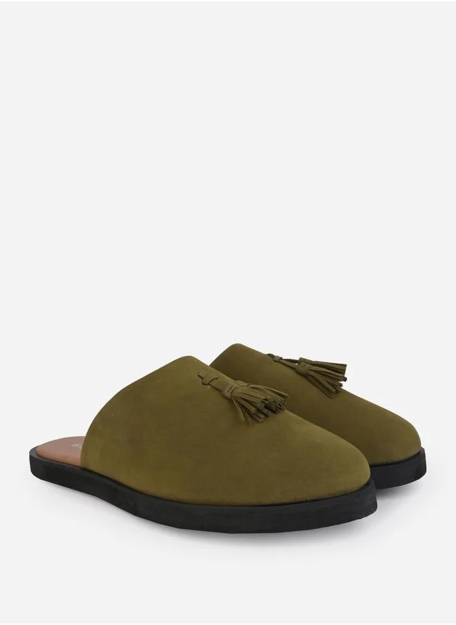 Styli Suede Clogs with Tassel Detail