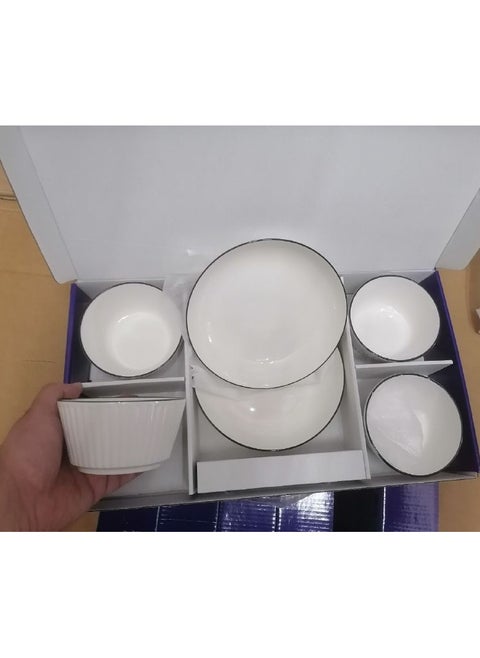 Porcelain bowl set with a colored frame. The 6-piece set consists of 4 porcelain bowls and 2 large plates.