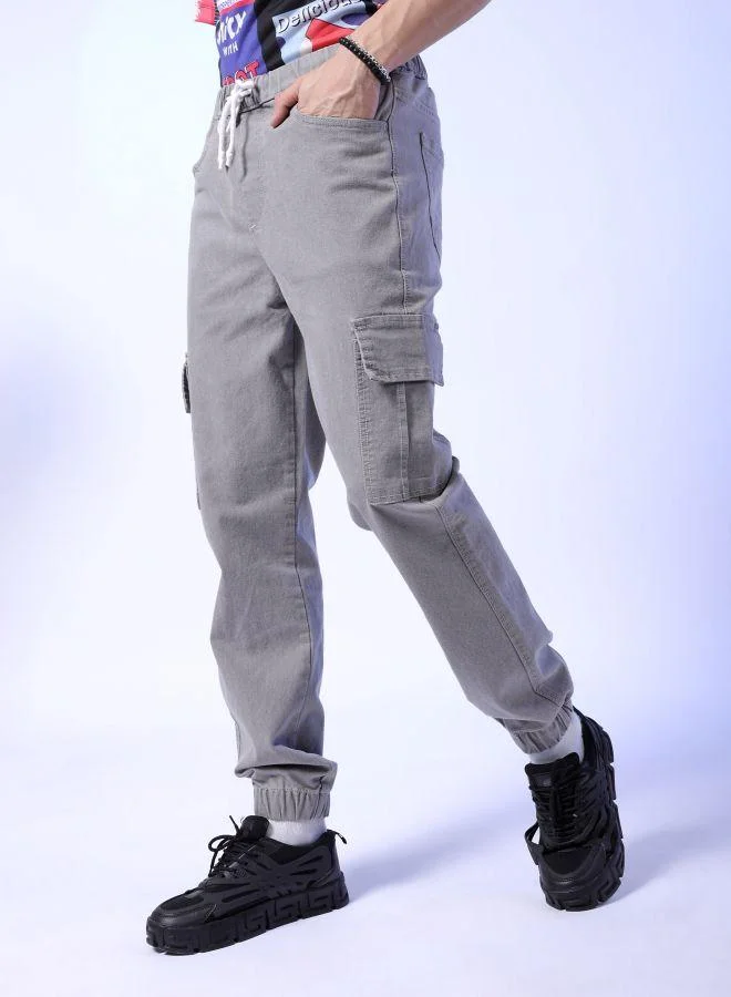 The Indian Garage Co  Men Regular Fit Solid Mid-Rise Stretchable Denim Cargo Joggers for Men | Best Price UAE