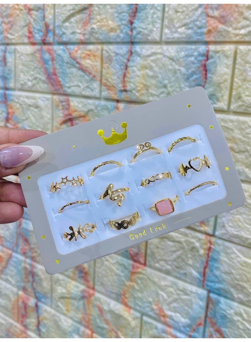 خواتم عقلة نسائية وبناتي – ستانلس ستيل ذهبي (12 خاتم)  الوصف: كارت خواتم عقلة من الاستانلس ستيل باللون الذهبي، يحتوي على 12 خاتم أنيق بتصاميم متنوعة تناسب النساء والبنات. خامة عالية الجودة مقاومة للصدأ والتغير، تضيف لمسة عصرية وجذابة لكل إطلالة. - Image 3