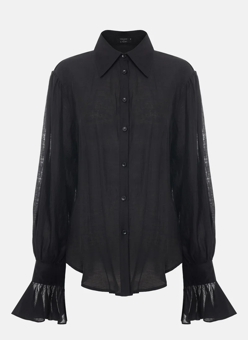 Lichi Fluffy blouse with flounces on the cuffs