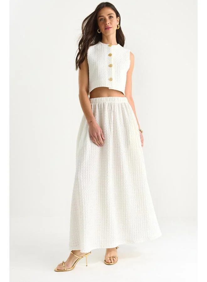 جينجر طقم بلوزة بدون أكمام وتنورة