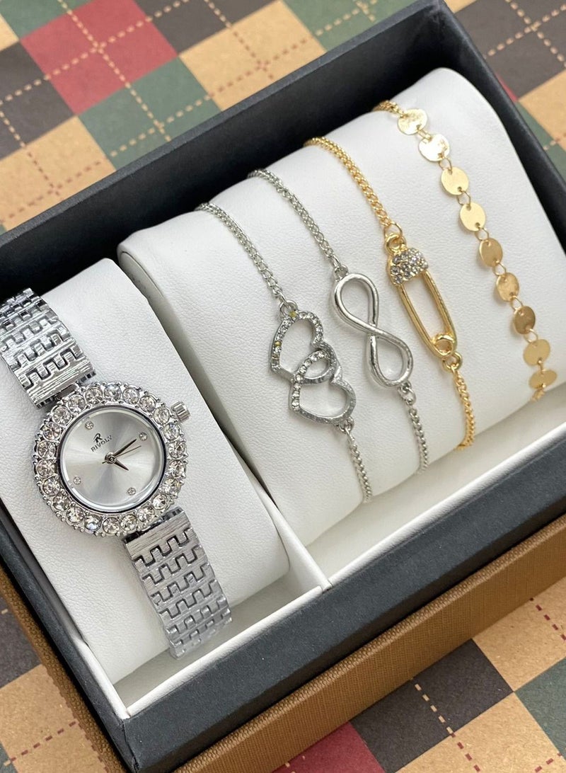 ريفولي طقم نسائي يتكون من ساعة ومجموعة اساور نواعم من الستانلس ستيل