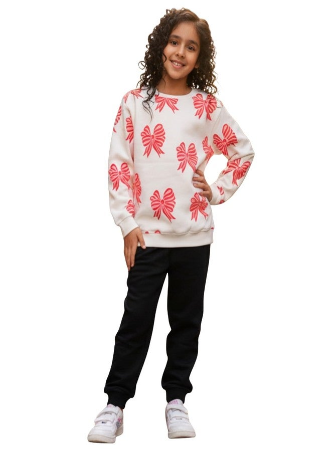 انثريلو طقم رياضي وكنزة صوفية سوداء للبنات من أنثريلو، مزين بفيونكة وردية - أبيض/أسود | 5-6 سنوات - Image 1