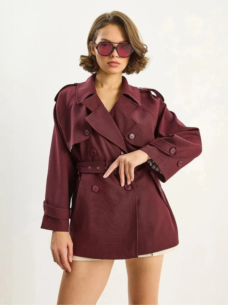 بيانكو لوتشي معطف ترنش ميدي قطني بأزرار من لوكسي