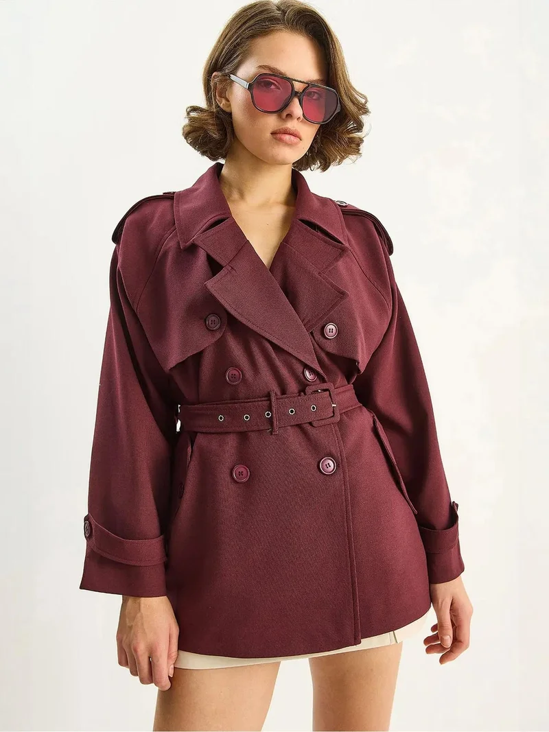 بيانكو لوتشي معطف ترنش ميدي قطني بأزرار من لوكسي