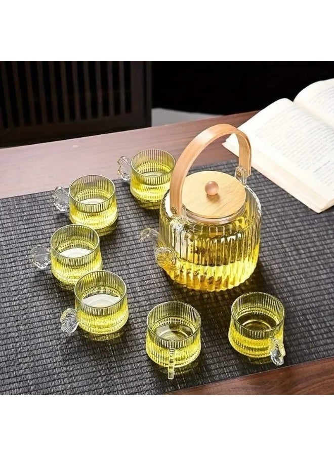 A heat-resistant glass set featuring six small cups made of raw crystal glass with an elegant design. - Image 1