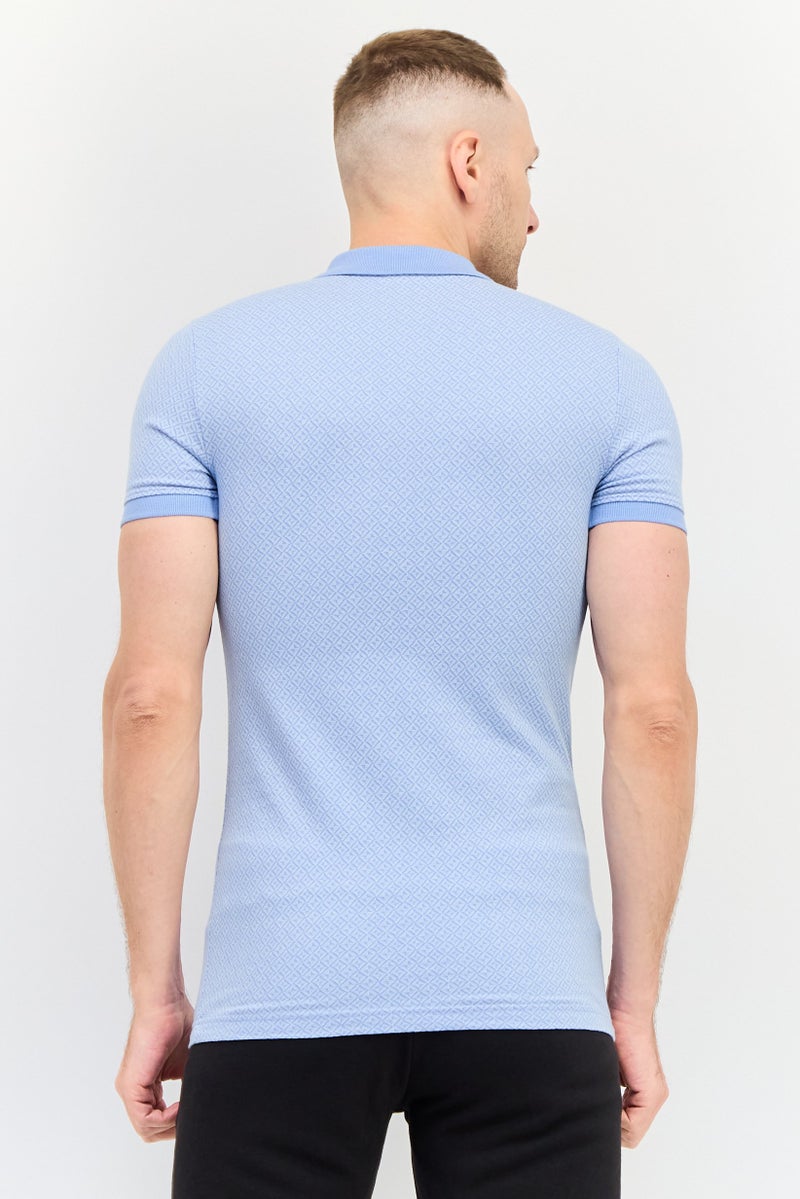 PUMA قميص بولو خارجي بأكمام قصيرة للرجال بتصميم ضيق مع شعار مطرز، أزرق فاتح - Image 3