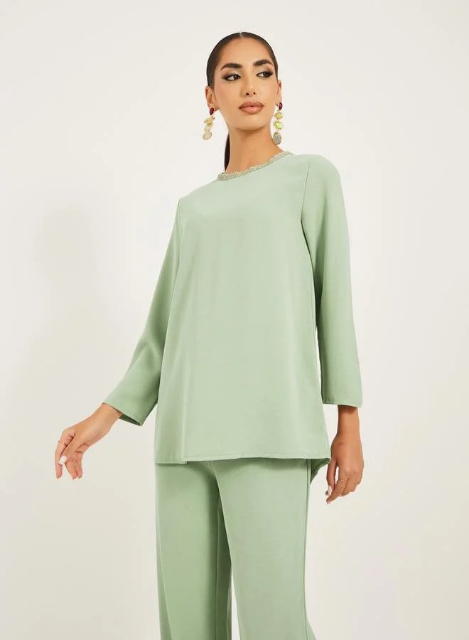 Styli 3/4th sleeve length long top with gold lace trims and wide leg pants modest set