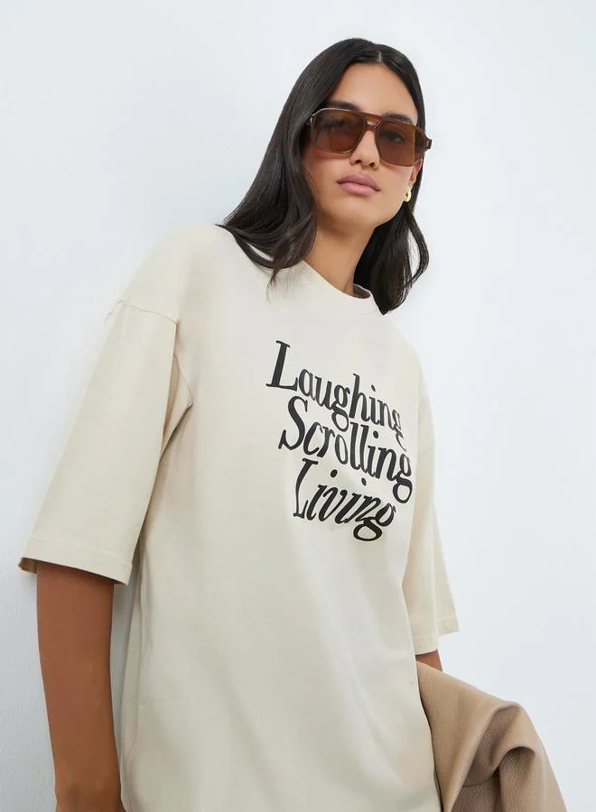 Styli Beige Slogan Print Oversized Cotton T-Shirt