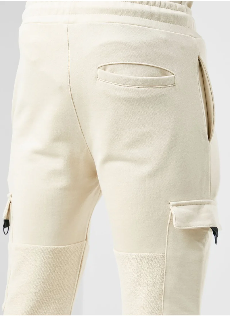 CRIMINAL DAMAGE Reverse Cut & Sew Sweatpants