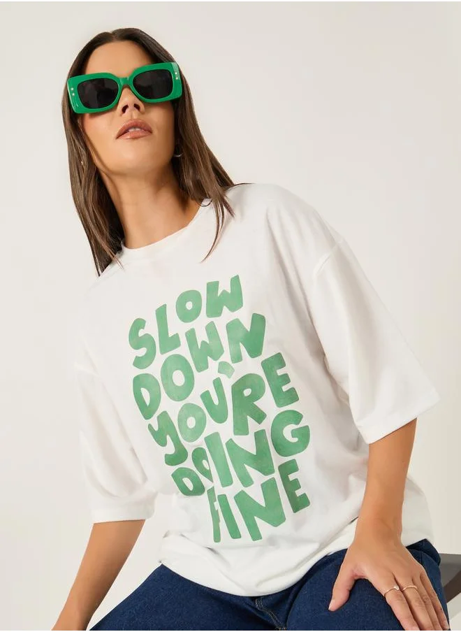 Styli Slogan Print Short Sleeve Oversized T-Shirt